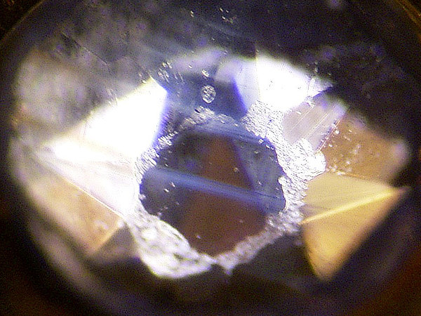 An old sapphire showing colour bands