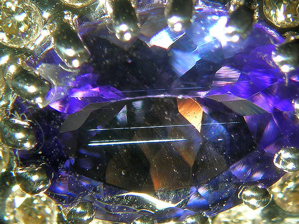 Tanzanite  with diamonds in a ring